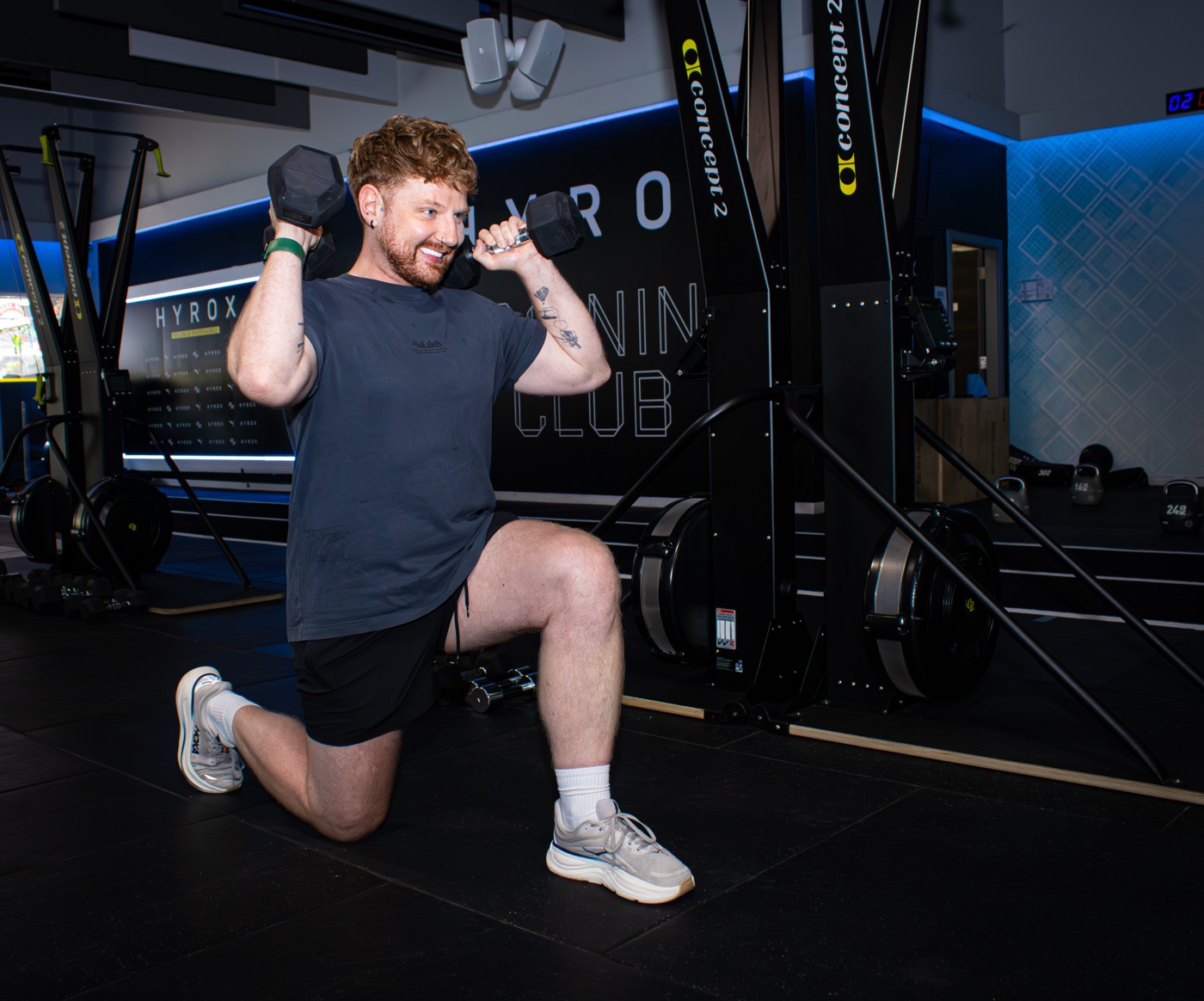 Andy Kirkpatrick training with a dumbbell in a lunge